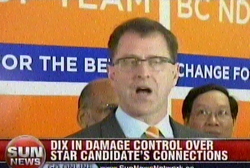 Chinese Communist Party-linked NDP candidate Frank Huang stands behind Socialist NDP leader Adrian Dix, who stands behind Huang. 