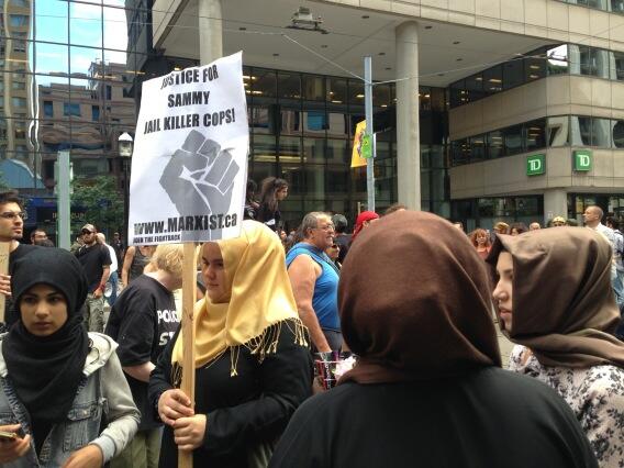 Marxist.ca sign at protest mob-fest